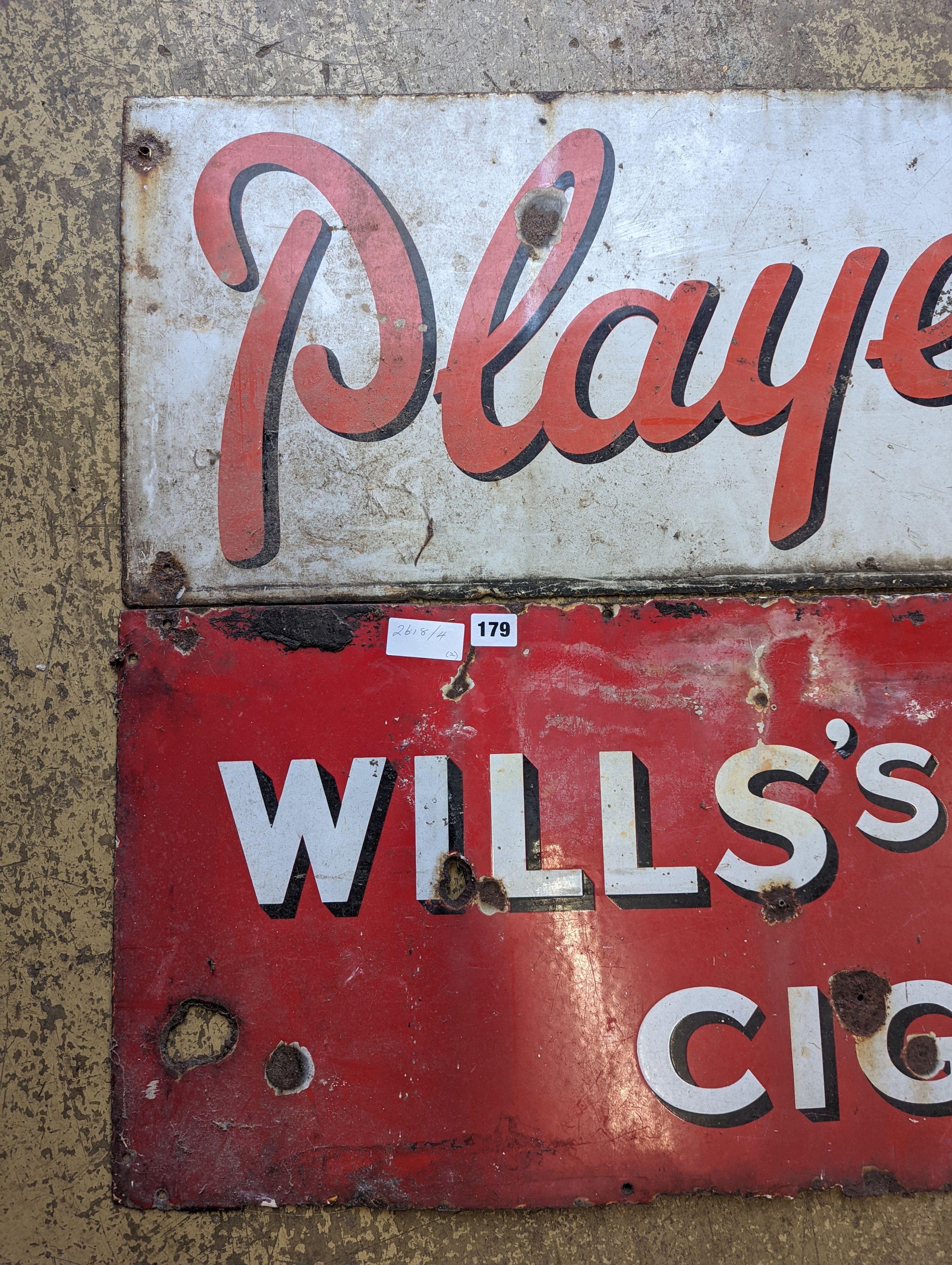 Two enamel advertising signs, 'Wills's Star' and 'Player's Please', larger length 154cm, height 38cm